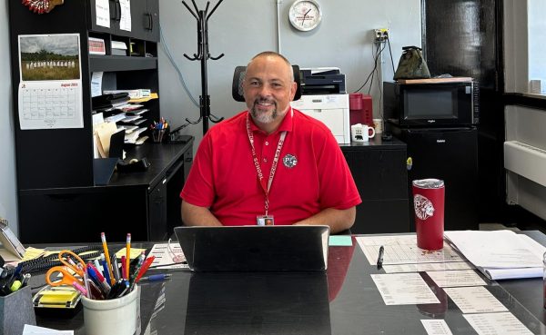 New principal Jason Potts at his desk.