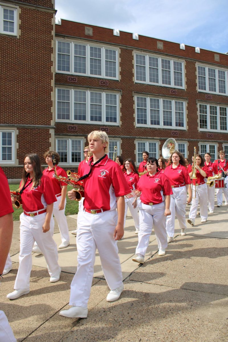 The Big Red Band marches in the Rivalry Week school walkthrough Sept. 20 in front of the school.