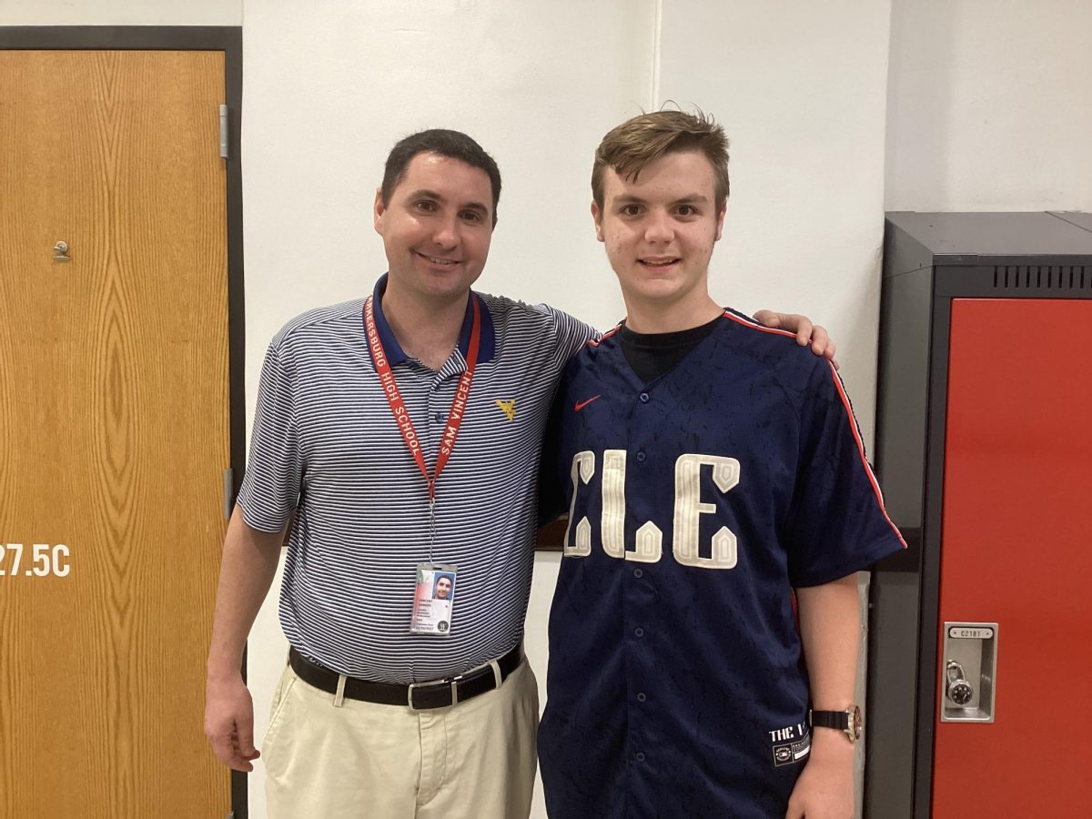 Sophomore Tyler Bell with his favorite teacher, Samuel Vincent. “He helps everybody and is really nice. He doesn’t yell, which is awesome.”