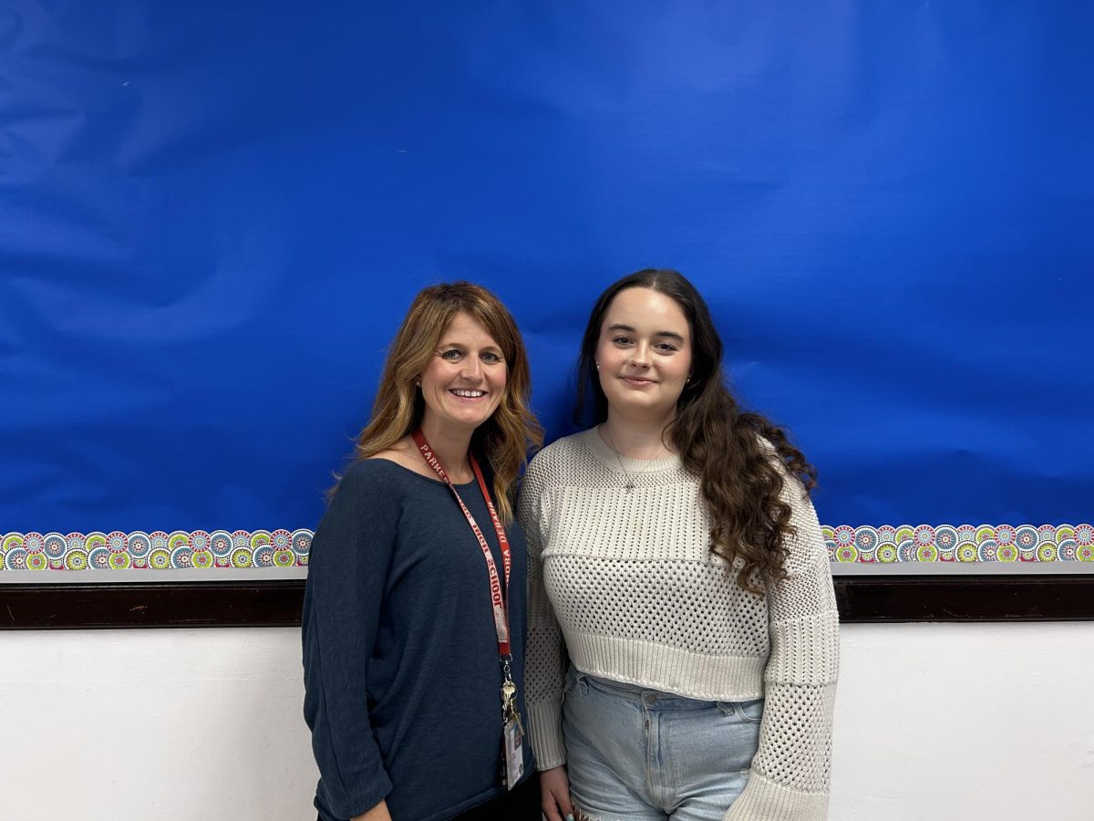 Junior Kara Pascarella with her favorite teacher, Chandra DeBarr. "Mrs. DeBarr makes her classroom a great environment to learn in. She goes over contents in a way that isn't overwhelming and shows a type of grace I aspire to have. Walking into her class is always a good time because it's interactive and shows that learning can be fun. Not only is Mrs. DeBarr's class a wonderful place to be, but Mrs. DeBarr herself is fun and energetic."