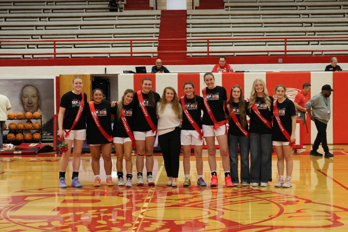 Girls basketball seniors and athletic trainer Mackenzie Rice.