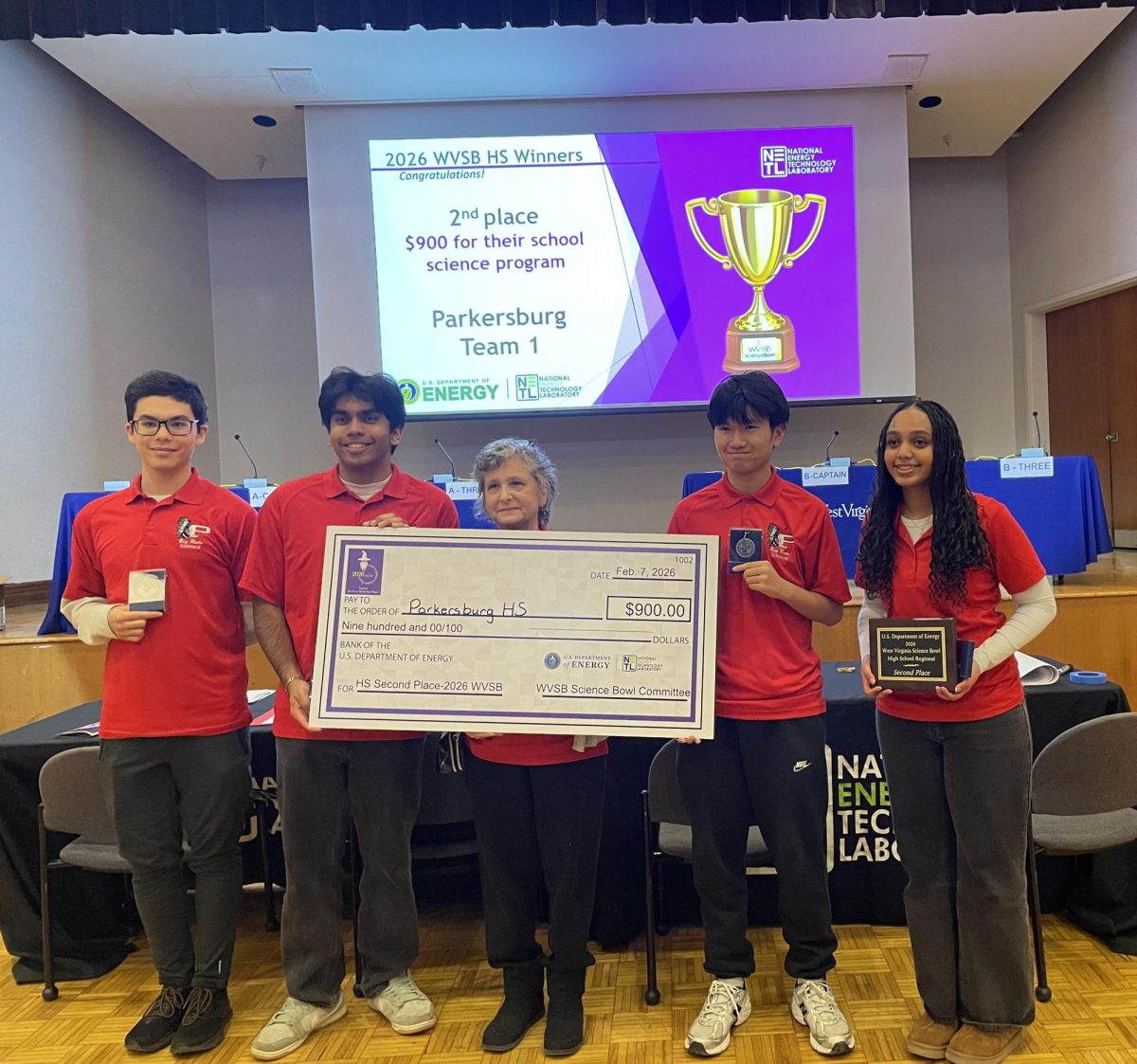 Seniors Ember Galloway and Smit Babariya, Science Bowl adviser Lisa Berry and sophomores Aaron Huynh and Liya Tewodros pose for a picture after winning second place in the West Virginia Regional Science Bowl Competition.