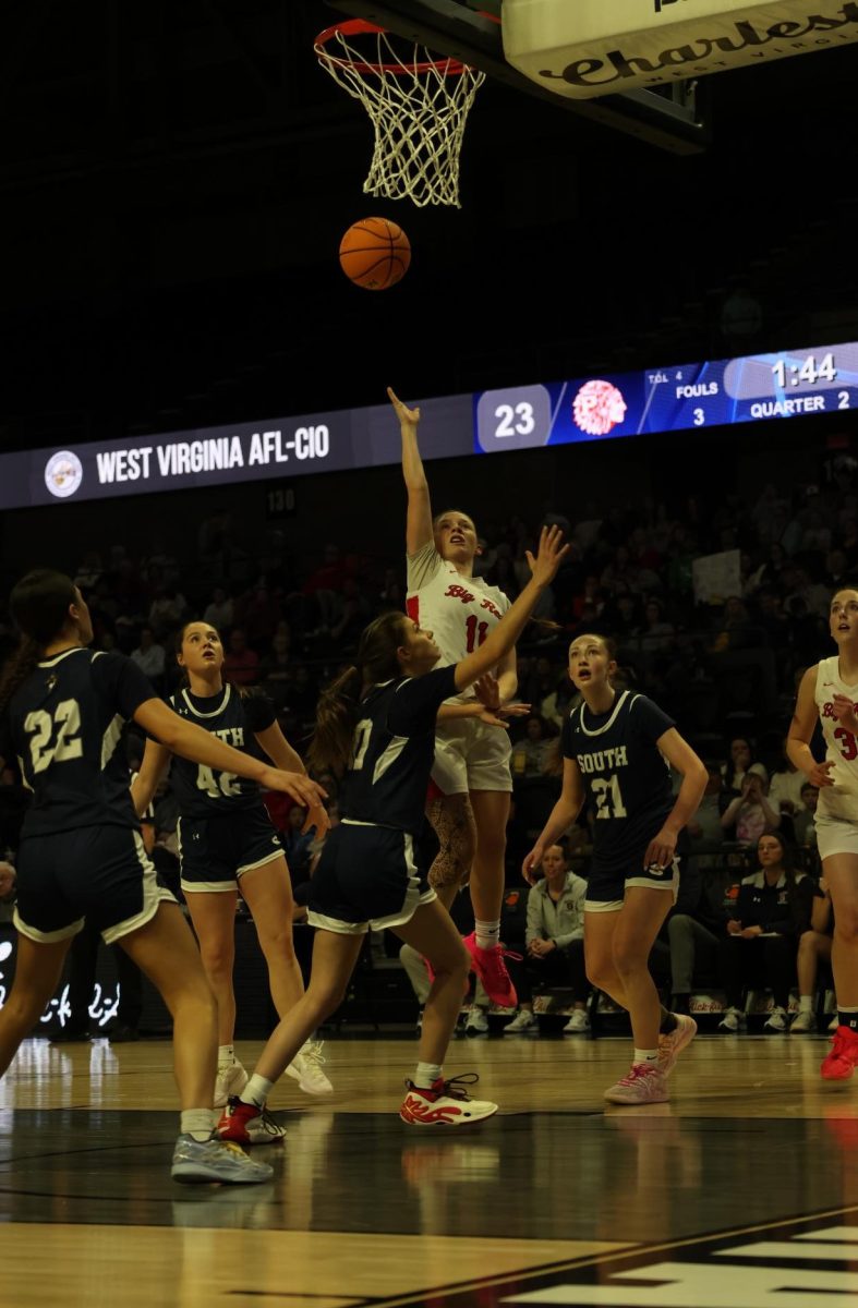 Sophomore Faithlyn Butcher shoots a layup March 14.