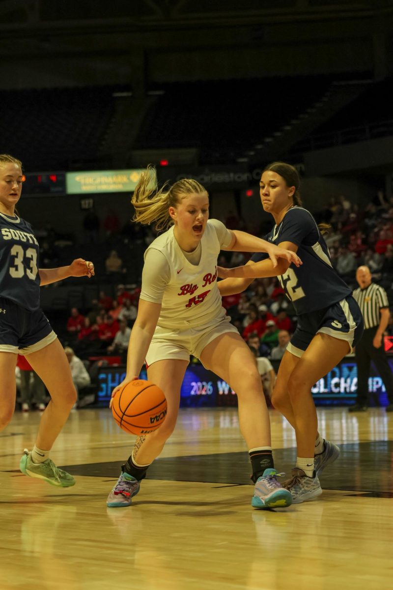 Senior Lucie Cline does a post move March 14. 