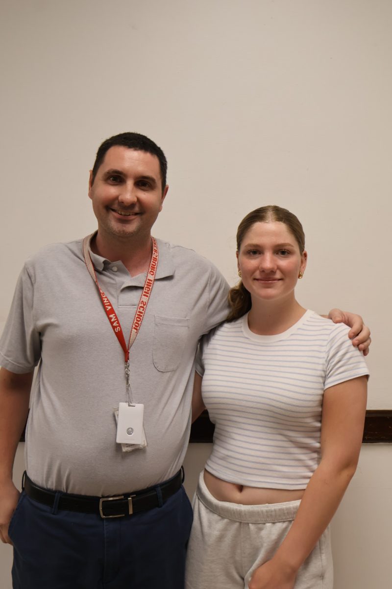 Junior Katie Eckhart with her favorite teacher, Sam Vincent. "He's nice to everyone. He is always there for everyone, and I could just talk to him about anything," Eckhart said. 