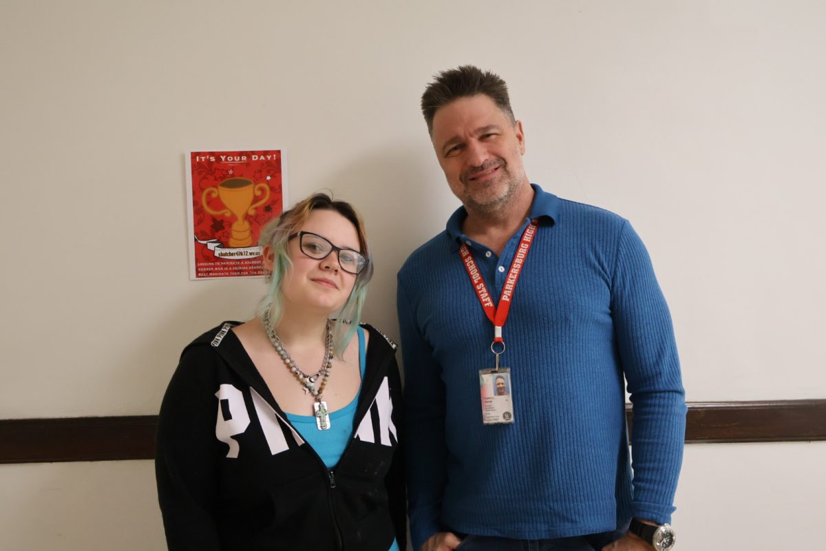 Junior Brooklynn Hornbeck with her favorite teacher, Mark Purcell. "His class is very easy to understand and he's easy to talk to," Hornbeck said.