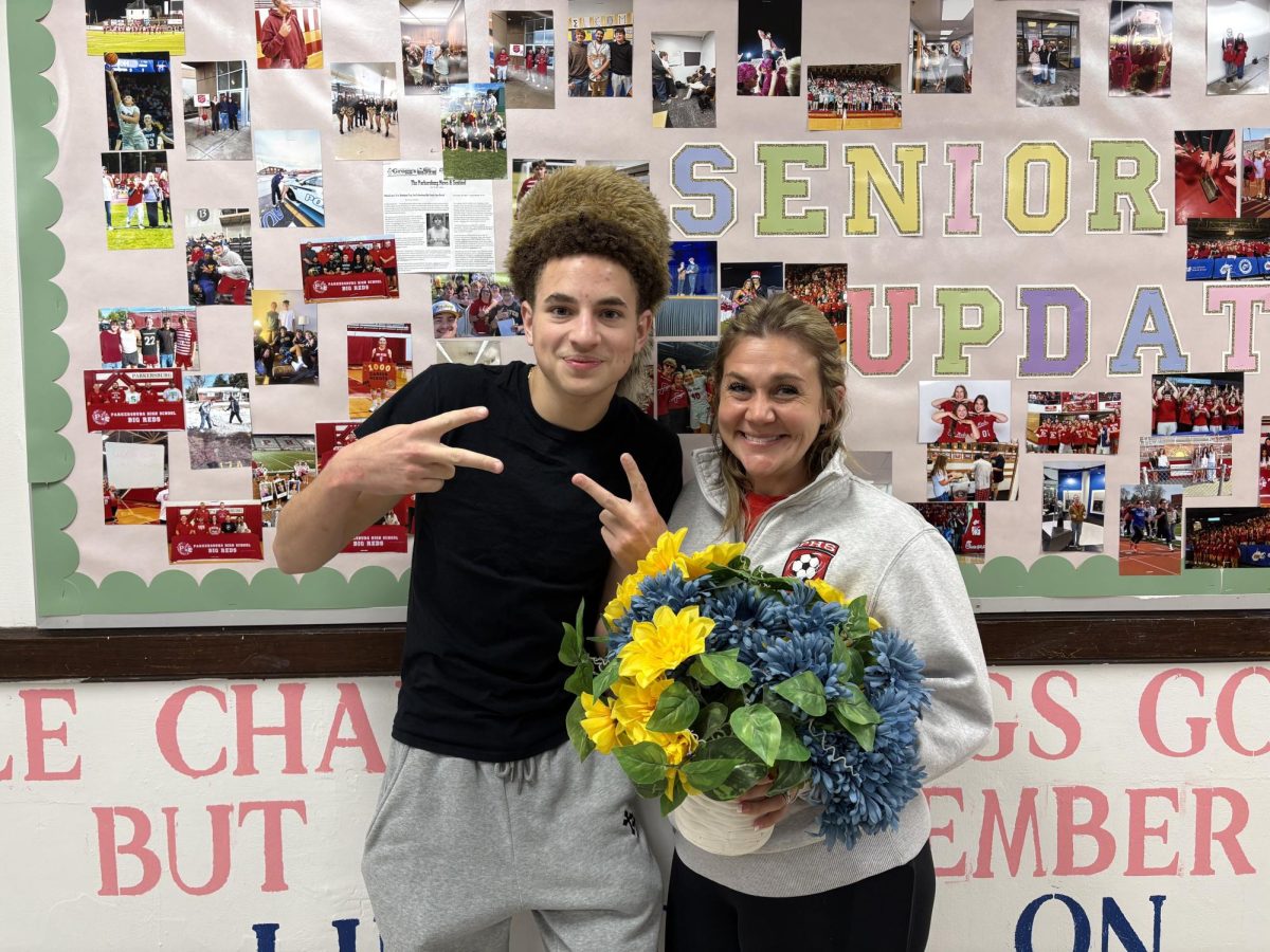Senior Kendrick Allman with his favorite teacher, Elizabeth Lockney. "Mrs. Lockney is the GOAT, the Greatest of All Teachers," Allman said.
